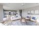 Bright living room, hardwood floors, open to kitchen at 4730 E Shadowbrook Dr, Camby, IN 46113