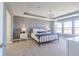 Spacious main bedroom with a metal bed frame and large windows at 4730 E Shadowbrook Dr, Camby, IN 46113