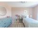 Charming bedroom with a dresser and a twin-sized bed at 4751 E Shadowbrook Dr, Camby, IN 46113