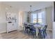Dining room with farmhouse-style table, chairs, and artwork at 4751 E Shadowbrook Dr, Camby, IN 46113