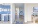 Bright hallway with light flooring and access to other rooms at 4751 E Shadowbrook Dr, Camby, IN 46113