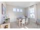 Home office featuring a wooden table, comfortable chairs, and natural light at 4751 E Shadowbrook Dr, Camby, IN 46113