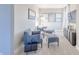 Cozy sitting area with comfortable seating and a media console at 4751 E Shadowbrook Dr, Camby, IN 46113