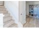 Elegant carpeted staircase leading to the upper level at 4751 E Shadowbrook Dr, Camby, IN 46113