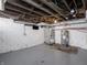 Unfinished basement with HVAC and water heater at 512 E 33Rd St, Indianapolis, IN 46205