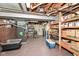Basement workshop with shelving and storage for tools at 5202 Woodside Dr, Indianapolis, IN 46228