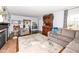 Living room with hardwood floors, fireplace, and comfortable seating at 5202 Woodside Dr, Indianapolis, IN 46228