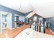 Spacious loft bedroom with a sitting area and a small bathroom at 5202 Woodside Dr, Indianapolis, IN 46228