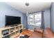 Cozy media room featuring a leather couch and large screen TV at 5202 Woodside Dr, Indianapolis, IN 46228