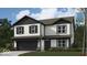 Two-story house with gray and white siding, dark gray shutters, and a two-car garage at 5209 Cartland Dr, Indianapolis, IN 46239