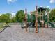 Community playground features a variety of play structures and equipment for children in a safe environment at 5209 Cartland Dr, Indianapolis, IN 46239