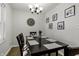 Simple dining room with a dark wood table and four chairs at 5341 Fenmore Rd, Indianapolis, IN 46228