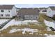 Gray house with backyard, partially covered in snow, and a wooden gazebo at 5486 W Woodhaven Dr, McCordsville, IN 46055