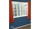 Bedroom with orange curtains and blue walls at 5914 Mornay Dr, Indianapolis, IN 46254