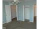 Spacious bedroom with ample closet space and neutral walls at 5914 Mornay Dr, Indianapolis, IN 46254