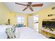 Comfortable bedroom with large bed and view of a laundry room adds to the charm of the home at 6234 Bobwhite Dr, Nineveh, IN 46164