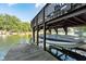 Private boat dock offering secure storage for watercraft, providing convenient access to the lake for boating enthusiasts at 6234 Bobwhite Dr, Nineveh, IN 46164