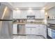 Functional kitchen with stainless steel appliances, ample countertop space, and white cabinetry at 6234 Bobwhite Dr, Nineveh, IN 46164