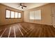 Spacious living room with hardwood floors and large windows at 644 Fankboner Ct, Greenwood, IN 46143