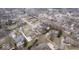 Expansive aerial perspective of a residential area highlighting lush greenery, well-maintained homes, and quiet streets at 6551 Forrest Commons Blvd, Indianapolis, IN 46277