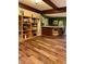 Finished basement with cozy bar area and custom bookshelf, perfect for relaxing and entertaining at 6551 Forrest Commons Blvd, Indianapolis, IN 46277
