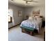 Relaxing bedroom features a comfortable bed, bright natural light, and serene decor at 6551 Forrest Commons Blvd, Indianapolis, IN 46277