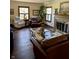 Cozy living room with fireplace and well-lit space, perfect for relaxing and entertaining at 6551 Forrest Commons Blvd, Indianapolis, IN 46277