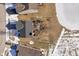 Aerial view of house showcasing a fenced backyard with deck and garden at 7541 Mather Ln, Indianapolis, IN 46239