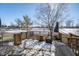 Wooden deck overlooks fenced backyard, perfect for relaxing at 7541 Mather Ln, Indianapolis, IN 46239