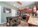 Modern kitchen with granite countertops, stainless steel appliances, and wood cabinets at 7541 Mather Ln, Indianapolis, IN 46239