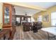 Spacious living room with a fireplace, hardwood floors, and leather furniture at 7541 Mather Ln, Indianapolis, IN 46239