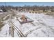 Aerial view of a neighborhood playground covered in winter snow at 7541 Mather Ln, Indianapolis, IN 46239