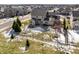 Aerial view of house with backyard patio and firepit, surrounded by neighborhood homes at 892 Ascot Farm Way, Westfield, IN 46074