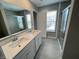 Spa-like bathroom with double vanity and large shower at 9577 Beckett St, Avon, IN 46123