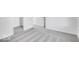 Bedroom featuring neutral carpet and access to additional rooms through multiple doorways at 1020 Stonehaven Dr, Indianapolis, IN 46239