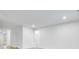 Bright living room featuring neutral walls and floors, providing a blank canvas for customization and ample natural light at 1020 Stonehaven Dr, Indianapolis, IN 46239
