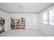 Spacious bedroom with bookcases and window at 1217 Charleston Commons Dr # 25, Anderson, IN 46012