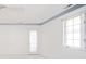 Bedroom with ceiling fan and exterior access at 1217 Charleston Commons Dr # 25, Anderson, IN 46012