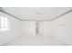 Spacious bedroom with ceiling fan and multiple doors at 1217 Charleston Commons Dr # 25, Anderson, IN 46012
