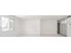 Empty dining room with white walls and carpeting at 1217 Charleston Commons Dr # 25, Anderson, IN 46012