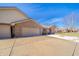 Brick home with a two-car attached garage and driveway at 1217 Charleston Commons Dr # 25, Anderson, IN 46012