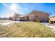 Brick front of house with attached garage and snowy lawn at 1217 Charleston Commons Dr # 25, Anderson, IN 46012