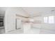 Kitchen boasts white cabinets, pink countertops, and an island at 1217 Charleston Commons Dr # 25, Anderson, IN 46012