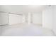 Empty living room with white walls and carpet at 1217 Charleston Commons Dr # 25, Anderson, IN 46012