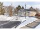 Community pool covered in snow and surrounded by fence at 12584 Tennyson Ln # 208, Carmel, IN 46032