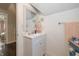 Simple bathroom with white vanity, a sink, and a decorative shower curtain at 1525 S New Jersey St, Indianapolis, IN 46225