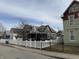 House with white picket fence and landscaping at 1525 S New Jersey St, Indianapolis, IN 46225