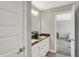 Elegant bathroom featuring a double sink vanity and modern fixtures at 16258 Perrault Ct, Fishers, IN 46040