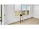 Bright sunroom with view of lake and backyard at 17083 Cole Evans Dr, Noblesville, IN 46060