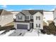 Two-story home with gray and white exterior, and a gray two-car garage at 17935 Paula, Westfield, IN 46074